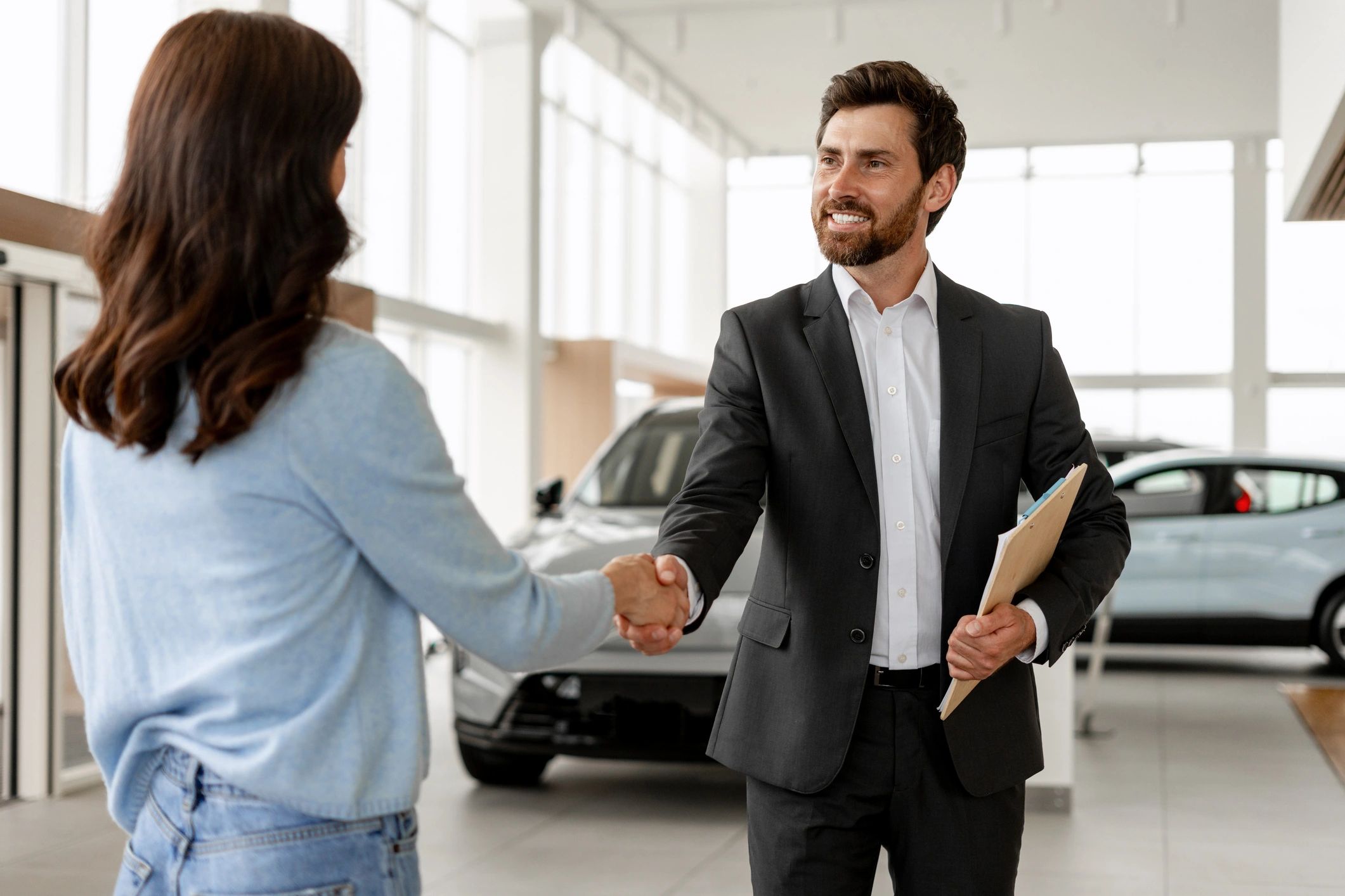 car sales team handshake